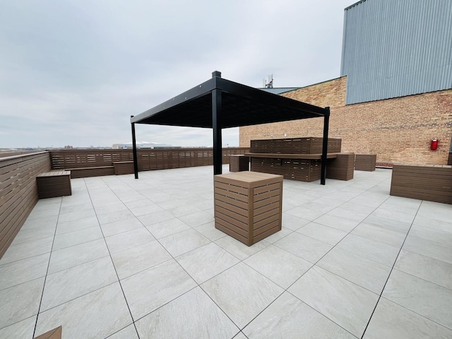 view of patio / terrace featuring exterior kitchen