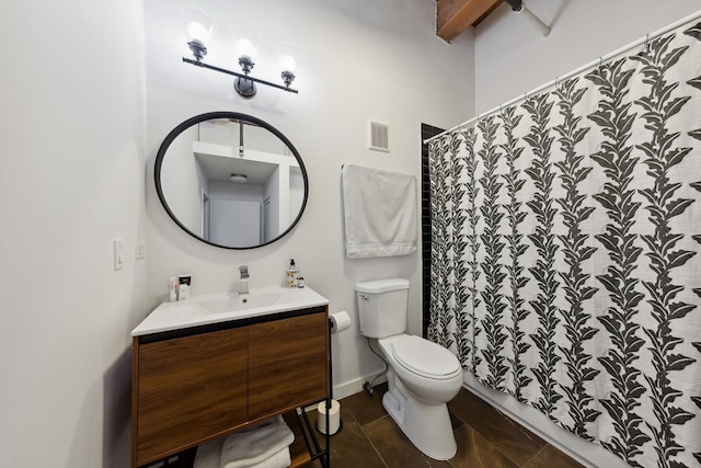 bathroom with toilet, visible vents, a shower with shower curtain, and vanity