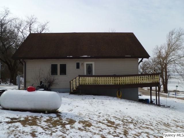 exterior space featuring a wooden deck