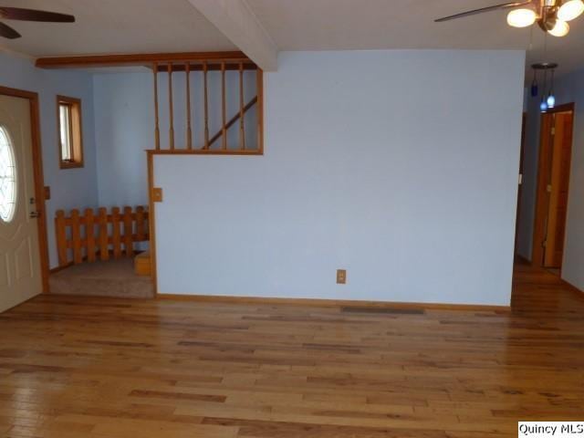 entryway with light hardwood / wood-style flooring and ceiling fan