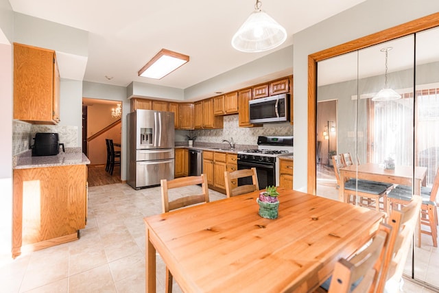 7914 S Garfield Ave, Burr Ridge, IL 60527 - dining area featuring light tile patterned floors