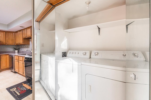 7914 S Garfield Ave, Burr Ridge, IL 60527 - washroom featuring washing machine and clothes dryer and light tile patterned floors