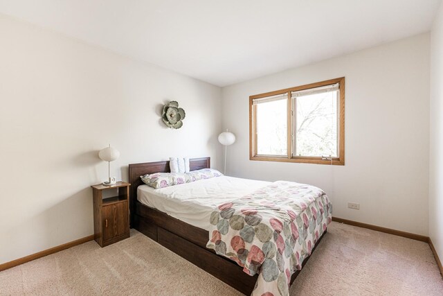 7914 S Garfield Ave, Burr Ridge, IL 60527 - bedroom with light carpet