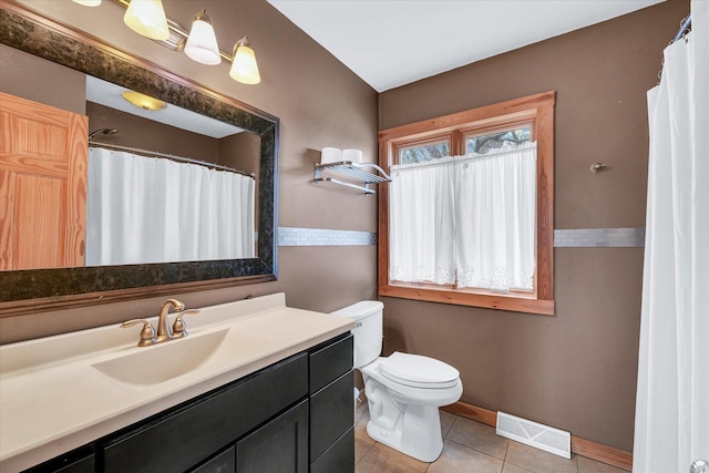 full bathroom featuring visible vents, toilet, tile patterned flooring, baseboards, and vanity