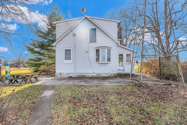 rear view of house featuring a patio area