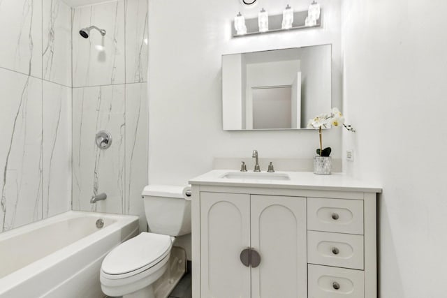 bathroom featuring toilet, tub / shower combination, and vanity