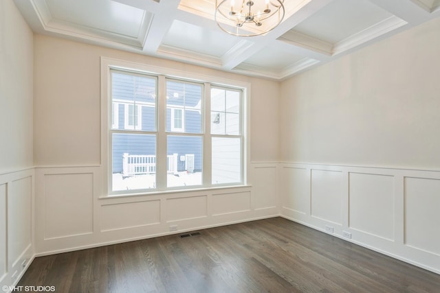 spare room with beam ceiling, visible vents, dark wood-type flooring, and a notable chandelier