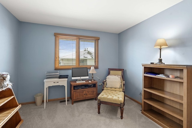 living area with light carpet