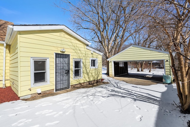 exterior space with a detached carport