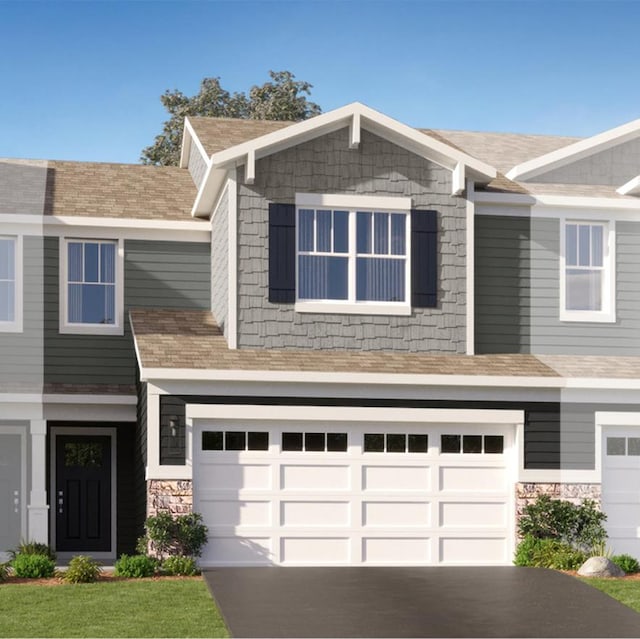 view of front of home with a garage