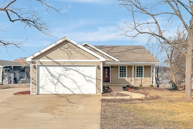 view of front of house with driveway and an attached garage