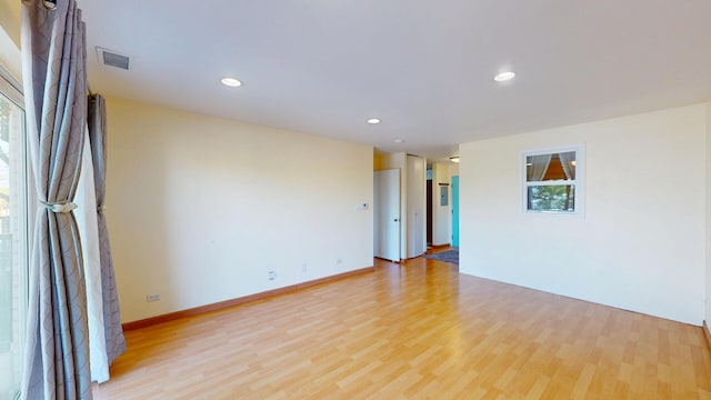 8640 Waukegan Rd Unit 227, Morton Grove, IL 60053 - unfurnished room with wood finished floors, recessed lighting, and baseboards