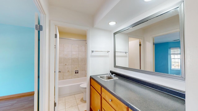 8640 Waukegan Rd Unit 227, Morton Grove, IL 60053 - bathroom featuring toilet, vanity, and shower / bathtub combination