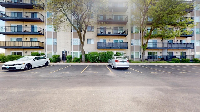 8640 Waukegan Rd Unit 227, Morton Grove, IL 60053 - view of apartment building / complex with uncovered parking