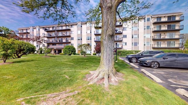 8640 Waukegan Rd Unit 227, Morton Grove, IL 60053 - view of apartment building / complex with uncovered parking