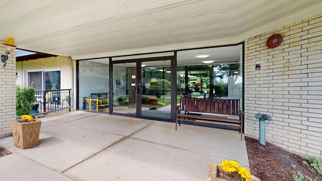 8640 Waukegan Rd Unit 227, Morton Grove, IL 60053 - view of exterior entry featuring brick siding