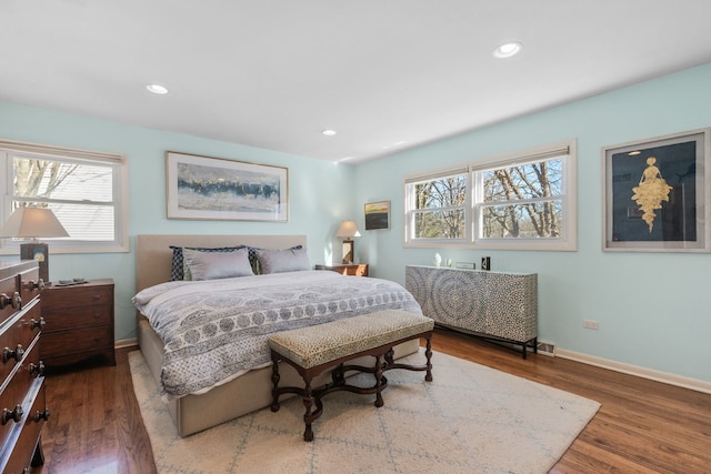 bedroom featuring recessed lighting, baseboards, and wood finished floors