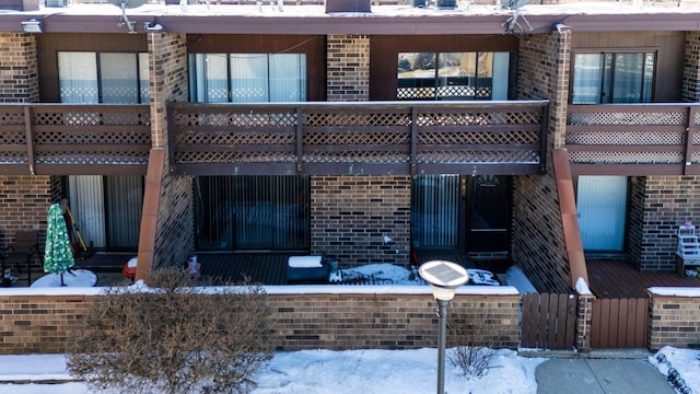 view of snow covered property