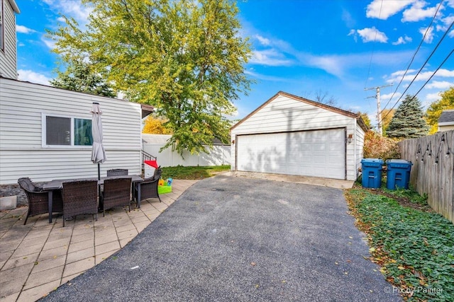 detached garage with fence