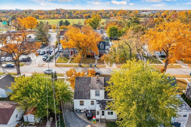 birds eye view of property with a residential view