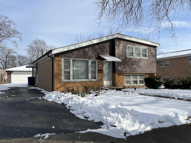 split level home featuring a garage