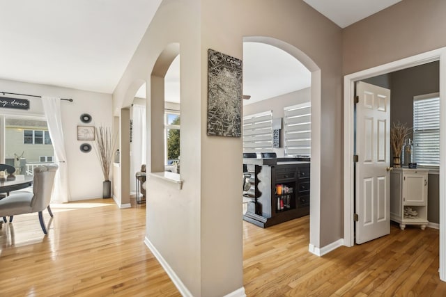 hallway with light wood-type flooring