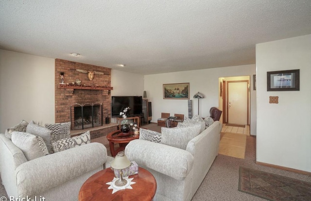 carpeted living area with a textured ceiling and a fireplace