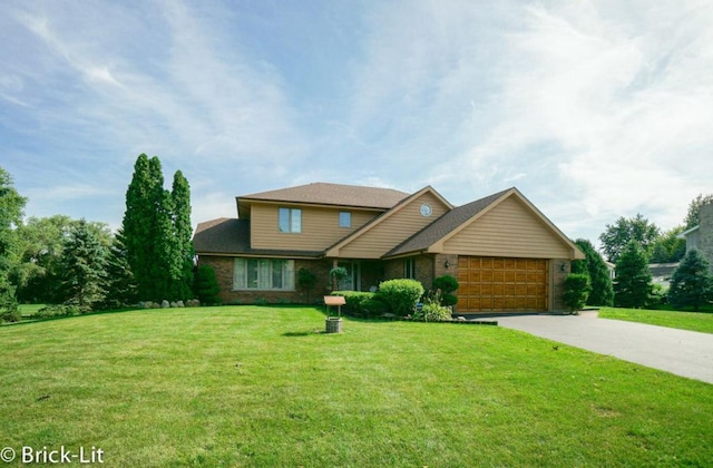 view of front facade featuring driveway, a front lawn, an attached garage, and brick siding