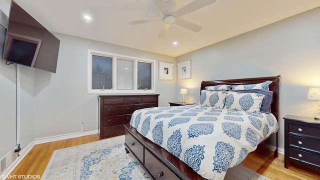 bedroom featuring light wood finished floors, baseboards, a ceiling fan, and recessed lighting