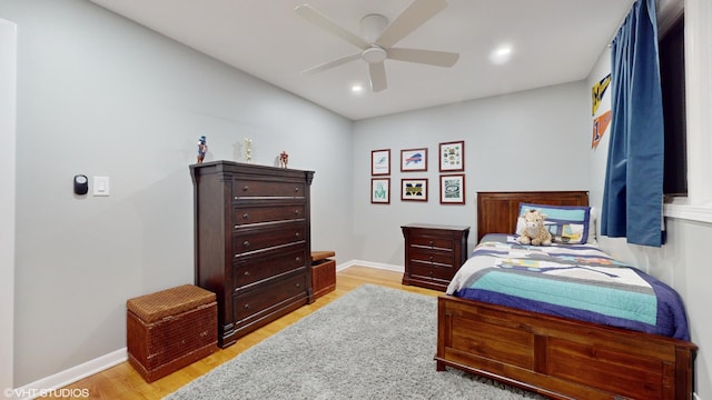 bedroom with ceiling fan, recessed lighting, wood finished floors, and baseboards