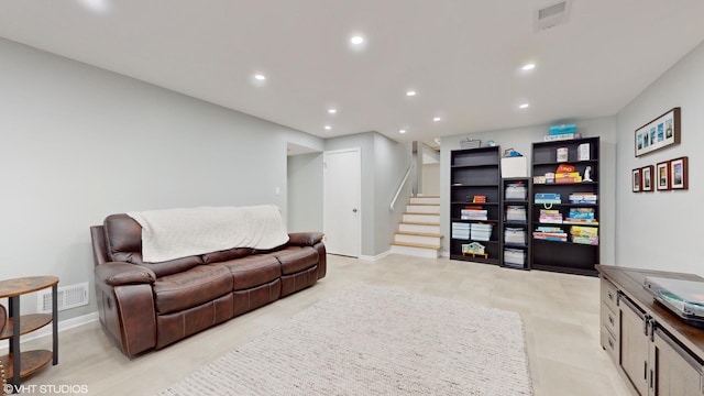 interior space with recessed lighting, visible vents, and stairway