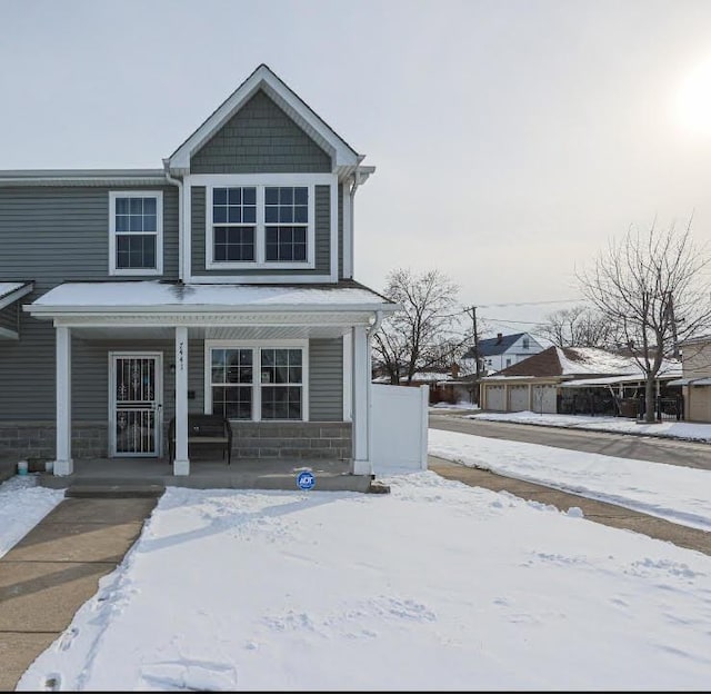 front facade featuring covered porch