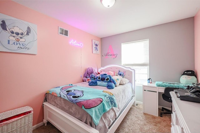 bedroom with light carpet