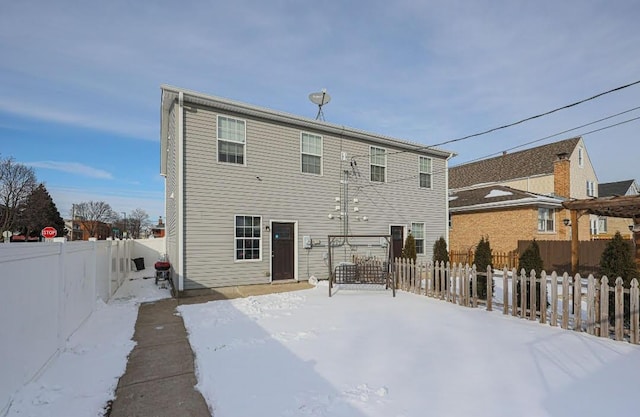 view of snow covered property