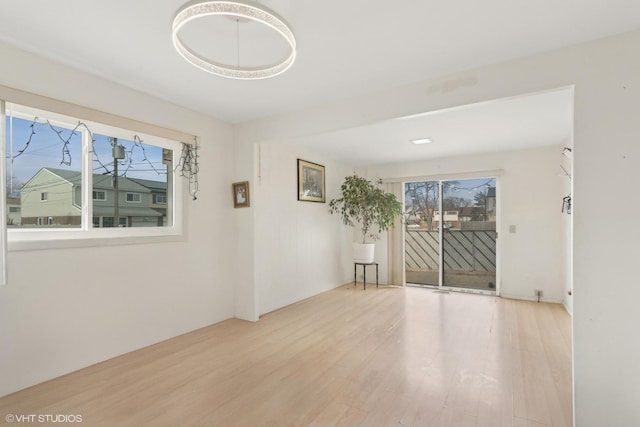 unfurnished room featuring light hardwood / wood-style floors