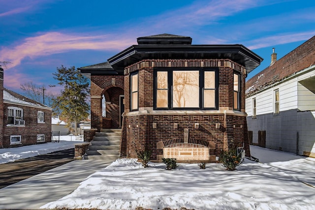 view of front facade with brick siding