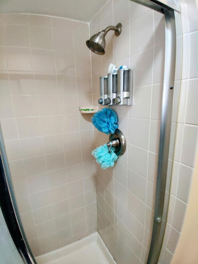 full bathroom with a stall shower