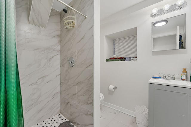 full bathroom featuring toilet, baseboards, marble finish floor, and tiled shower