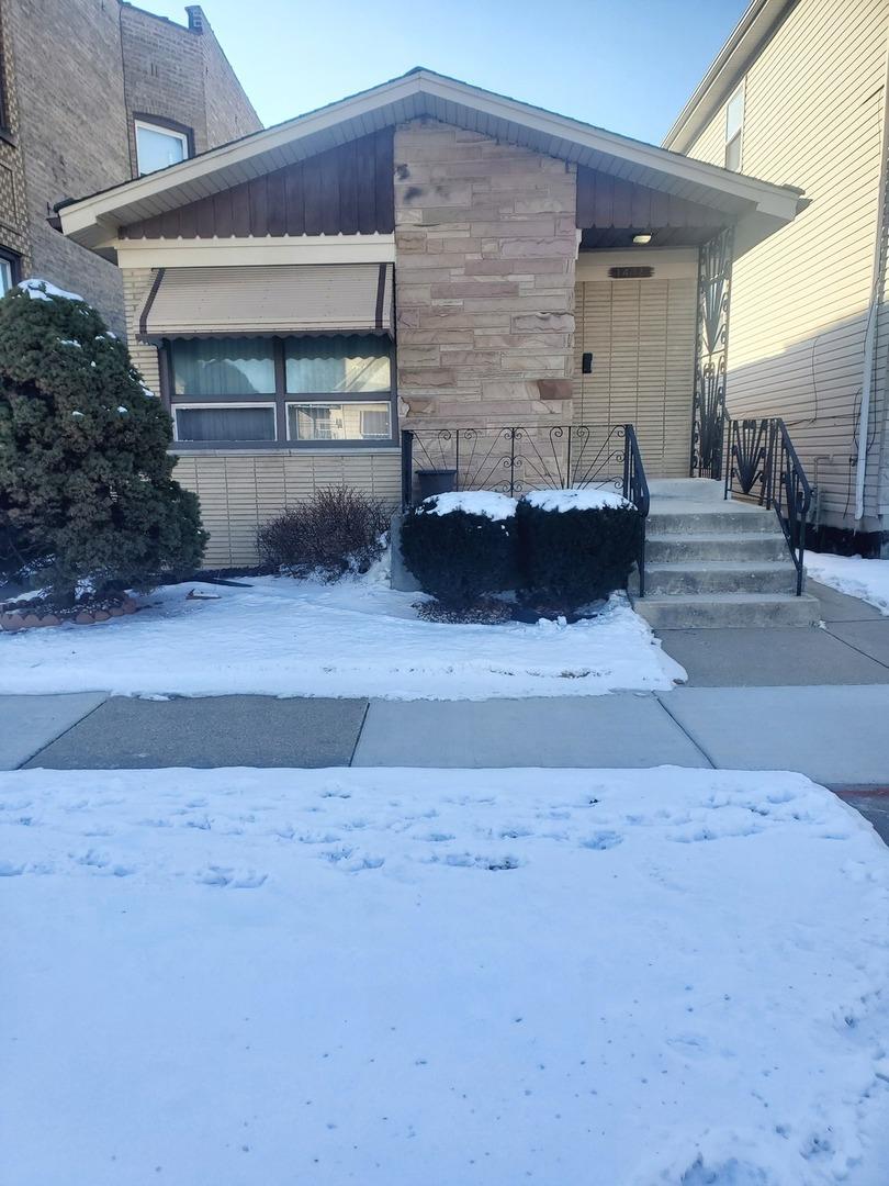 view of snow covered property