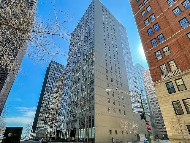 view of building exterior featuring a view of city