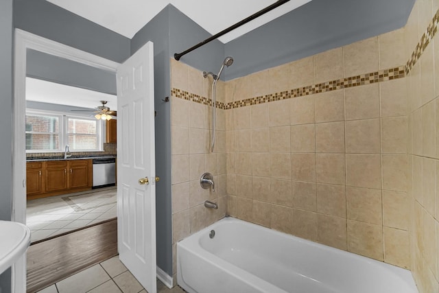 bathroom with a ceiling fan, shower / tub combination, vanity, and tile patterned floors