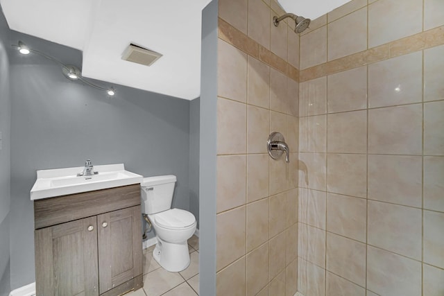 full bath featuring tile patterned flooring, toilet, visible vents, vanity, and tiled shower