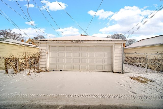 detached garage with fence