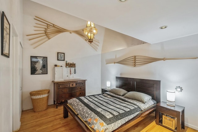 bedroom with light wood-type flooring