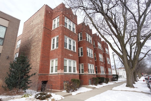 view of snow covered building