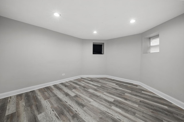 basement featuring hardwood / wood-style floors