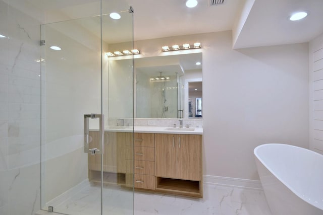 full bath with marble finish floor, double vanity, a soaking tub, a stall shower, and a sink