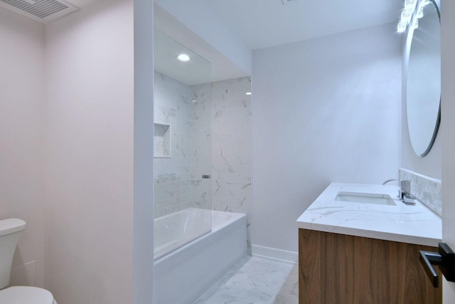 bathroom featuring toilet, vanity, visible vents, baseboards, and marble finish floor