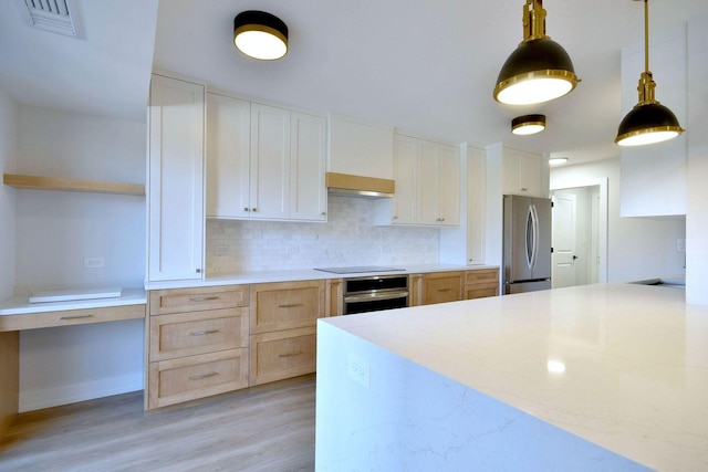 kitchen featuring stainless steel appliances, visible vents, light wood-style floors, open shelves, and tasteful backsplash