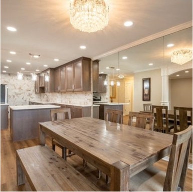 dining space with dark wood-type flooring, recessed lighting, a chandelier, and crown molding